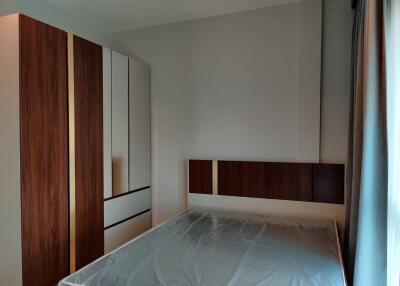 Bedroom with bed and wardrobe