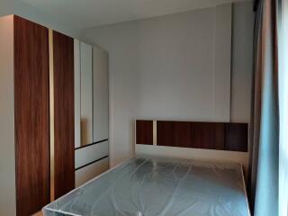 Bedroom with bed and wardrobe