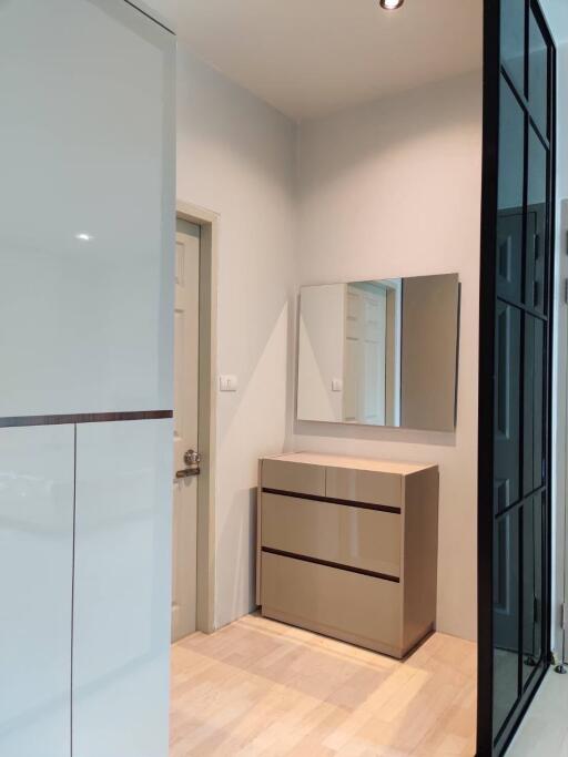 Modern bedroom with dresser and mirror