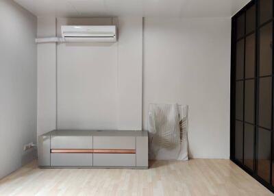 Modern minimalist living room with air conditioning