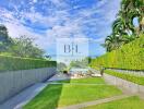 Beautiful backyard with pool and greenery