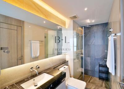 Modern bathroom with glass shower and sink