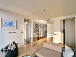 Bright and spacious living room with wooden floors and modern décor