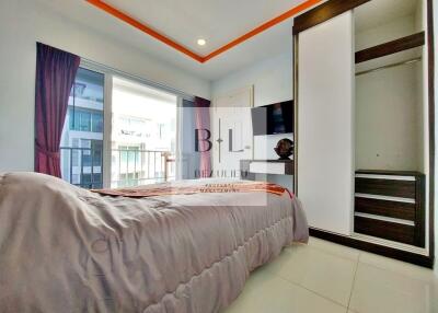 Modern bedroom with balcony access