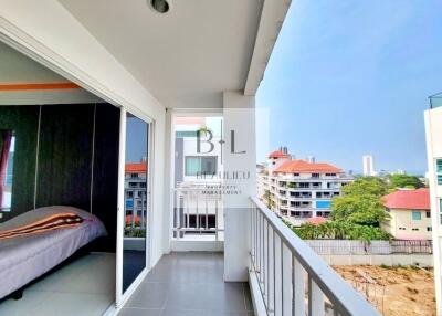 Balcony view with access to a bedroom