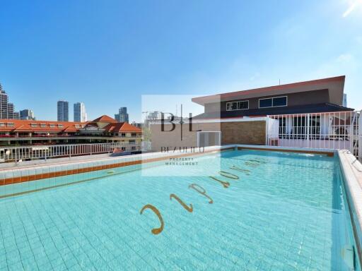 rooftop swimming pool with city view