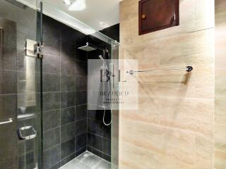 Modern bathroom with a glass-enclosed shower