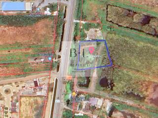 Aerial view of real estate property and surrounding area