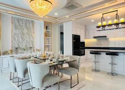 Modern dining area and kitchen with elegant decor