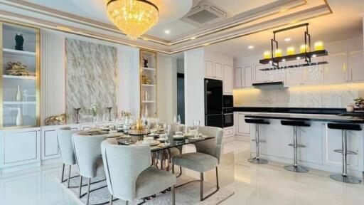 Modern dining area and kitchen with elegant decor