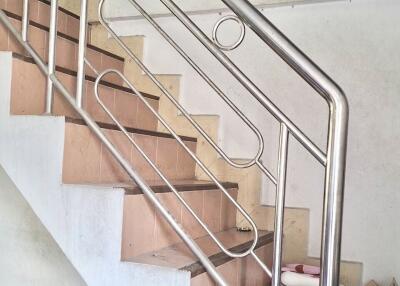 Indoor staircase with metal railing