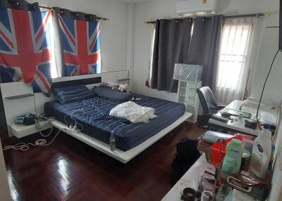 Modern bedroom with Union Jack curtains