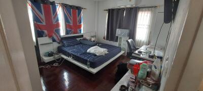 Modern bedroom with Union Jack curtains