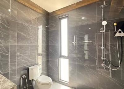 Modern bathroom with shower and toilet