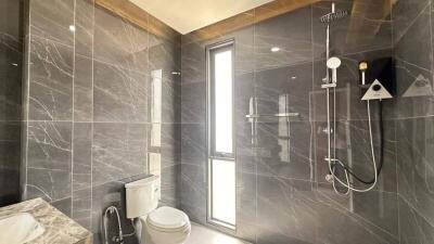 Modern bathroom with shower and toilet