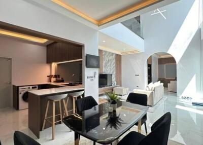 Modern kitchen and dining area with open plan living