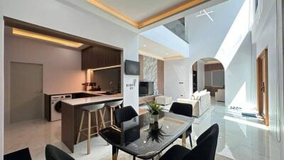 Modern kitchen and dining area with open plan living