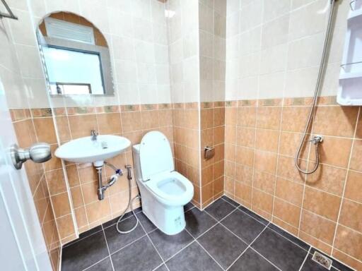 Modern bathroom with tiles and fixtures