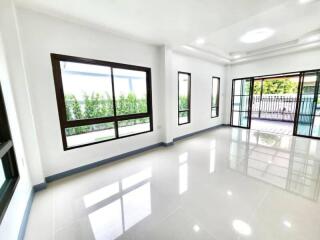 Bright and spacious living room with large windows