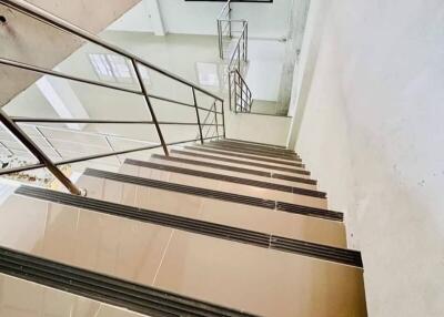 Staircase with glass railing in modern building