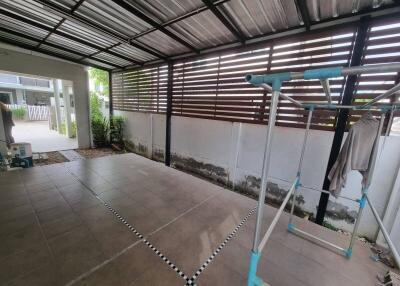 covered patio with tiled flooring