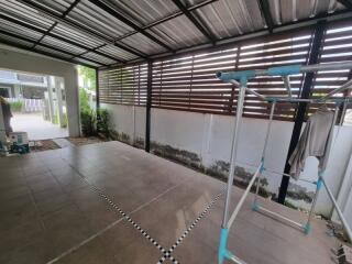 covered patio with tiled flooring