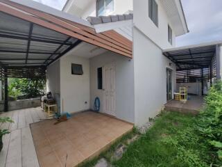 Exterior view of a house with covered patios