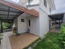 Exterior view of a house with covered patios