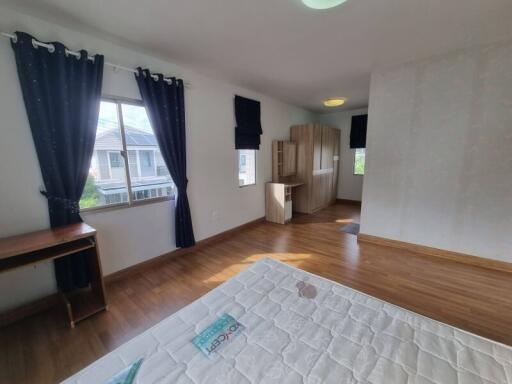 Spacious bedroom with natural light