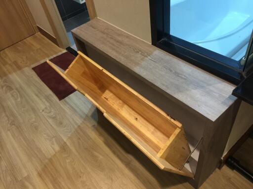 Living room with wooden storage bench