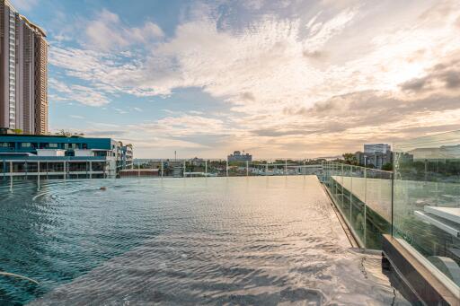 Rooftop pool with scenic sunset view