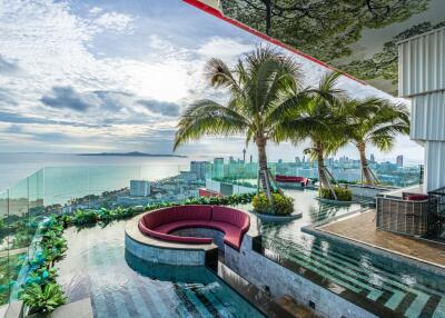 Rooftop pool with ocean and city view