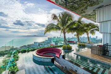 Rooftop pool with ocean and city view