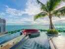 Rooftop pool area with ocean view