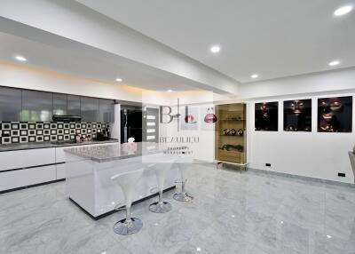 Modern kitchen with island and bar stools