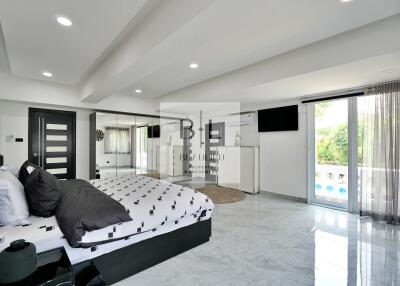 Spacious modern bedroom with en-suite balcony