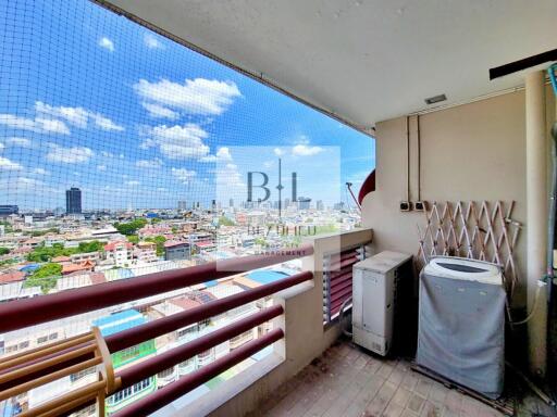 A balcony with a panoramic view of the city