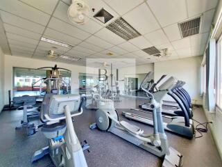 Residential gym with various exercise equipment