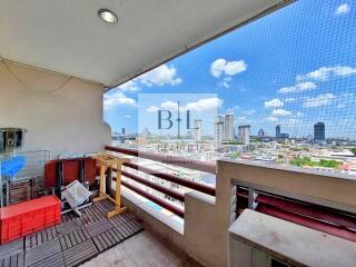 Spacious balcony with city view