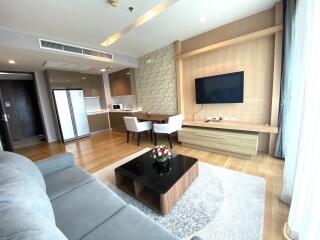 Modern living room with attached kitchen