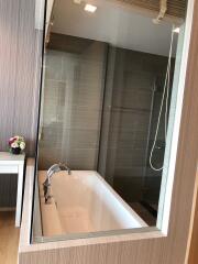 Modern bathroom with bathtub and shower