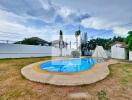 Outdoor swimming pool with surrounding patio