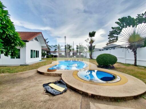 Outdoor area with swimming pool and surrounding landscape