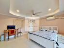 Spacious bedroom with natural light and modern amenities