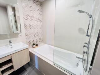 Modern bathroom with bathtub and sink