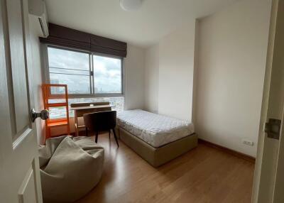 Bedroom with study desk and twin-sized bed