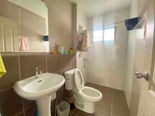 Bathroom with sink and toilet