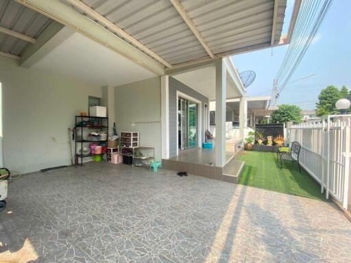 Spacious outdoor area with tiled flooring