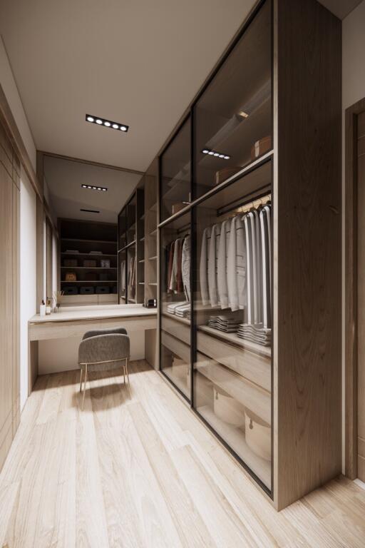 Modern walk-in closet with wooden flooring and ample storage