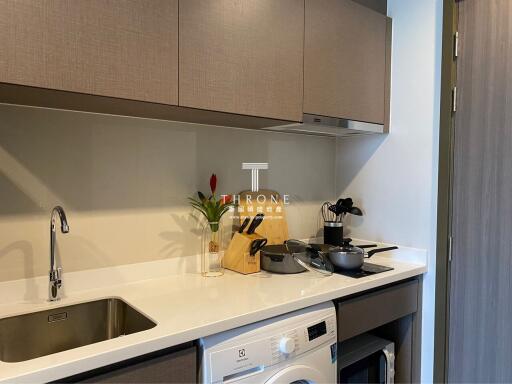 Modern equipped kitchen area with appliances